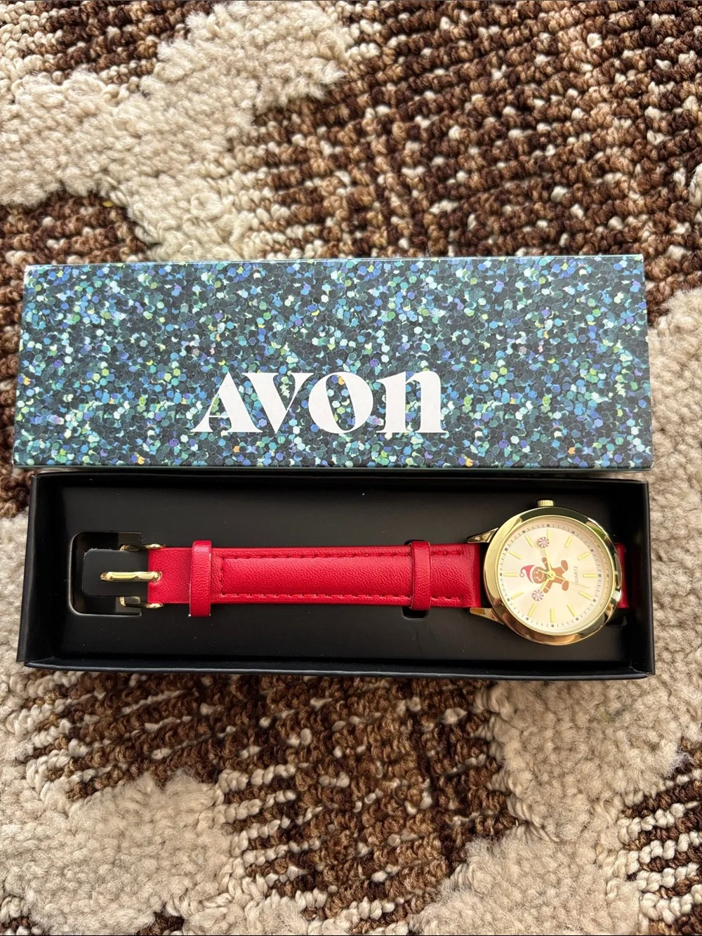 Avon gold tone